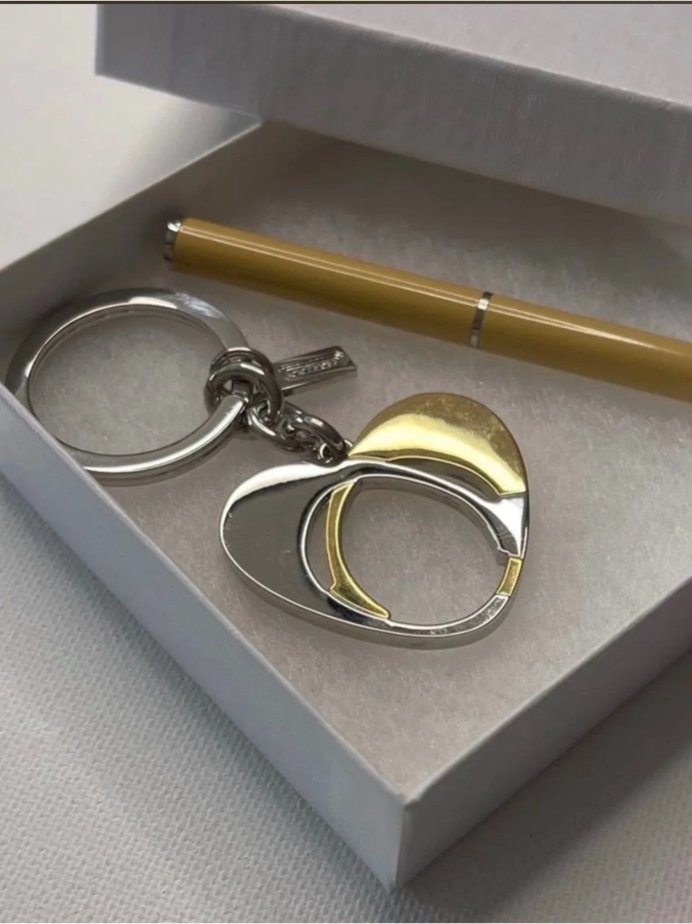 Coach Silver and Gold Heart
Keychain with Cream Coach Pen NWOT - Picture 5 of 5